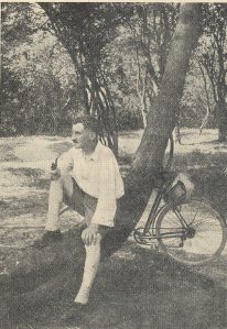 William Fitzwater Wray (Kuklos) with his bicycle by a tree, taken from his Obituary in the CTC Gazette